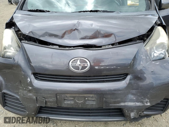 2012 Scion iQ z VIN JTNJJXB06CJ009187, wystawiony jako Copart lot #56563665 z przebiegiem 105 014 mil mil oraz Szkoda całkowita • Salvage title. Historia ofert i sprzedaży dostępna na DreamBid. Obrazek 11.