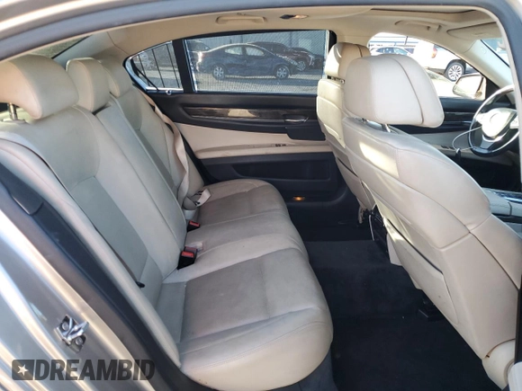 2009 BMW 7 Series 750Li with VIN WBAKB83569CY60521, listed as a Copart auction lot 82050884 with 142,788 mi miles and Salvage Title. Bid and sale history available at DreamBid. Image 11.