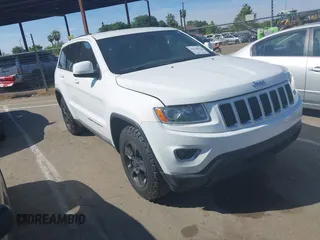 2014 Jeep Grand Cherokee Laredo with VIN 1C4RJFAG9EC334021, listed as a IAAI auction lot 42128823 with 161,741 mi miles. Bid and sale history available at carsss.com. Image 1.