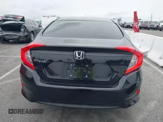 2016 Honda Civic Sedan LX with VIN 2HGFC2F52GH568029, listed as a IAAI auction lot 41735435 with 103,714 mi miles. Bid and sale history available at carsss.com. Image 16.