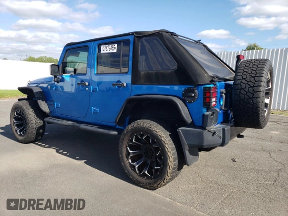2016 Jeep Wrangler Unlimited Sport z VIN 1C4BJWDG3GL115622, wystawiony jako Copart lot #57872455 z przebiegiem 98 812 mil mil oraz Szkoda całkowita • Salvage title. Historia ofert i sprzedaży dostępna na DreamBid. Obrazek 2.