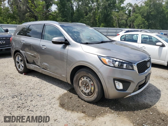 2016 Kia Sorento SX z VIN 5XYPKDA52GG141330, wystawiony jako Copart lot #55448425 z przebiegiem 78 330 mil mil oraz Szkoda całkowita • Salvage title. Historia ofert i sprzedaży dostępna na DreamBid. Obrazek 4.