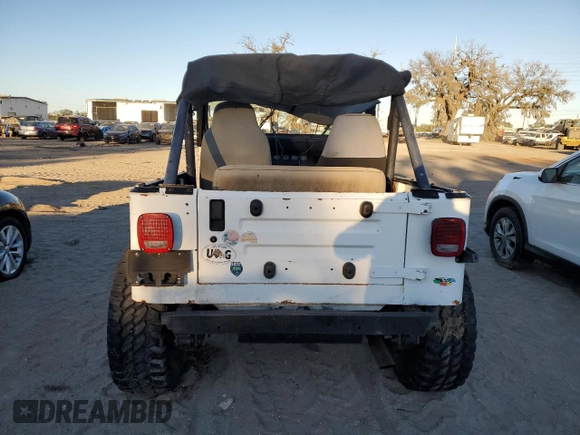1989 Jeep Wrangler with VIN 2J4FY29T2KJ154190, listed as a Copart auction lot 82113494 with 131,026 mi miles and Clean Title. Bid and sale history available at carsss.com. Image 6.