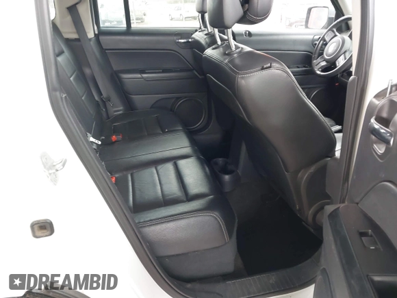 2014 Jeep Patriot High Altitude with VIN 1C4NJPFA0ED667162, listed as a IAAI auction lot 41752271 with 131,038 mi miles and . Bid and sale history available at carsss.com. Image 8.