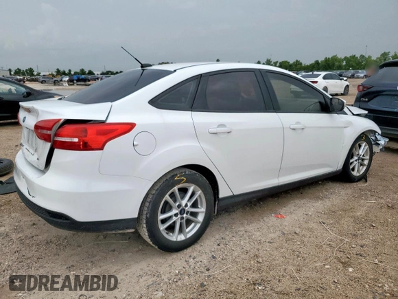 2016 Ford Focus SE with VIN 1FADP3F29GL259317, listed as a Copart auction lot 62646685 with 100,523 mi miles and Salvage title. Bid and sale history available at DreamBid. Image 3.