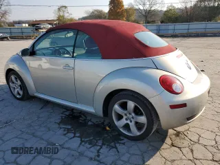 2009 Volkswagen Beetle Blush with VIN 3VWSG31Y49M411919, listed as a Copart auction lot 77814874 with 131,399 mi miles and Salvage title. Bid and sale history available at DreamBid. Image 2.