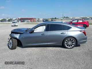 2022 Cadillac CT5 Premium Luxury z VIN 1G6DN5RK8N0117274, wystawiony jako IAAI lot #40798383 z przebiegiem 28 848 mil mil oraz . Historia ofert i sprzedaży dostępna na DreamBid. Obrazek 14.