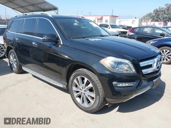 2014 Mercedes-Benz GL 450 with VIN 4JGDF7CE7EA414390, listed as a IAAI auction lot 42554915 with 114,997 mi miles and . Bid and sale history available at DreamBid. Image 1.