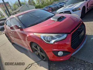 2013 Hyundai Veloster Turbo w/Black Int with VIN KMHTC6AE4DU142055, listed as a Copart auction lot 54666655 with 110,777 mi miles and Clean Title. Bid and sale history available at carsss.com. Image 1.