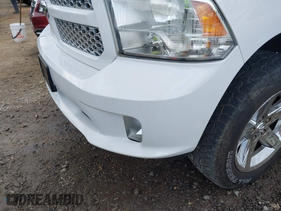 2015 Ram 1500 Tradesman with VIN 1C6RR7KG8FS648142, listed as a IAAI auction lot 41647459 with 100,696 mi miles and . Bid and sale history available at DreamBid. Image 6.