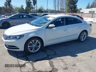2016 Volkswagen CC Sport with VIN WVWBP7AN7GE500242, listed as a IAAI auction lot 41760893 with 42,401 mi miles. Bid and sale history available at carsss.com. Image 2.