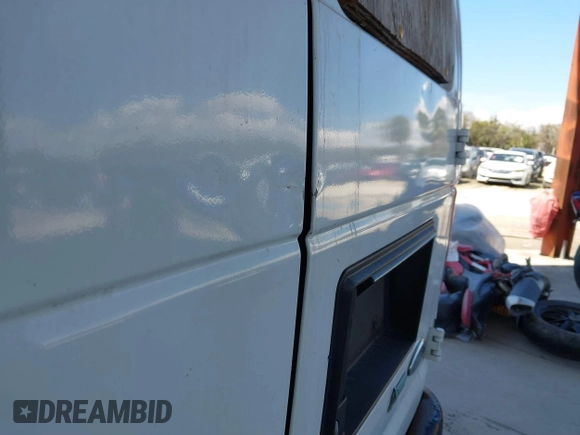 2014 Ford Econoline Cargo Commercial with VIN 1FTNE1EW1EDA66485, listed as a IAAI auction lot 41654271 with 304,974 mi miles and . Bid and sale history available at DreamBid. Image 19.