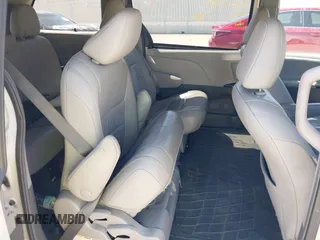 2015 Toyota Sienna XLE with VIN 5TDYK3DCXFS663083, listed as a IAAI auction lot 41967621 with 177,472 mi miles and . Bid and sale history available at DreamBid. Image 8.