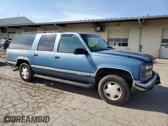 1997 GMC Suburban with VIN 1GKFK16R7VJ707618, listed as a Copart auction lot 49882035 with 317,771 mi miles and Salvage Title. Bid and sale history available at carsss.com. Image 4.