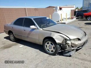 1996 Lexus ES 300 с VIN JT8BF12G7T0131193, выставлен на аукционе Copart как лот 73020074 с пробегом 122 108 миль миль и Списание • Salvage title. История ставок и продаж доступна на DreamBid. Изображение 4.