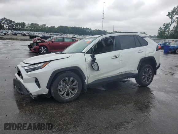 2024 Toyota RAV4 Hybrid XLE Premium with VIN 2T3B6RFV8RW074600, listed as a Copart auction lot 59560115 with 23,839 mi miles and Salvage title. Bid and sale history available at DreamBid. Image 1.
