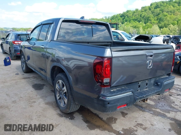 2018 Honda Ridgeline RTL-E with VIN 5FPYK3F74JB004162, listed as a IAAI auction lot 42180687 with 160,805 mi miles and . Bid and sale history available at DreamBid. Image 3.