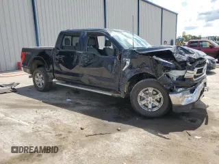 2023 Ford F-150 XL with VIN 1FTFW1E88PFC77984, listed as a Copart auction lot 62222845 with 36,957 mi miles and Salvage title. Bid and sale history available at DreamBid. Image 4.