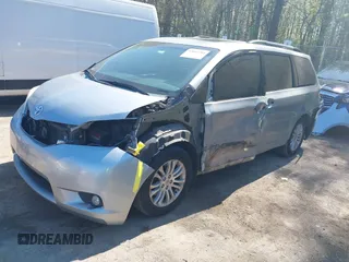 2015 Toyota Sienna XLE with VIN 5TDYK3DC0FS558486, listed as a IAAI auction lot 42064281 with 211,119 mi miles and . Bid and sale history available at DreamBid. Image 18.