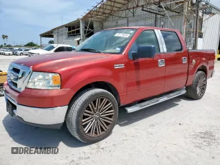 2007 Ford F-150 XLT with VIN 1FTRW12W97KC85972, listed as a Copart auction lot 61775655 with 103,406 mi miles and Salvage title. Bid and sale history available at DreamBid. Image 1.