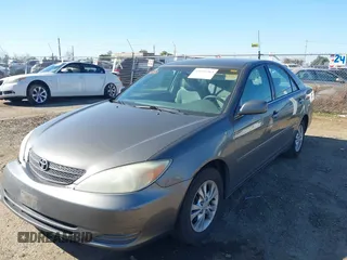 2004 Toyota Camry LE with VIN 4T1BF30K74U588368, listed as a IAAI auction lot 41659383 with 190,833 mi miles. Bid and sale history available at carsss.com. Image 2.