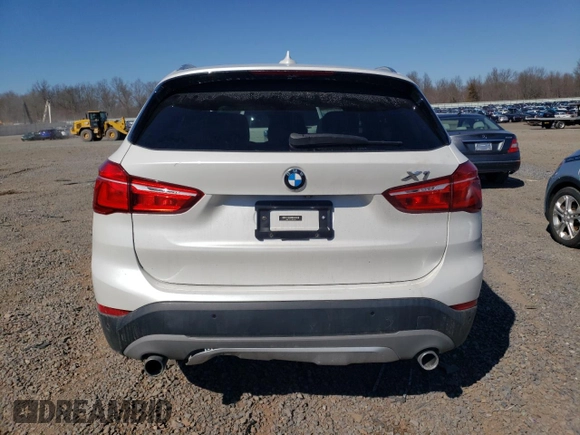 2017 BMW X1 xDrive28i with VIN WBXHT3C31H5F82700, listed as a Copart auction lot 48051095 with 76,861 mi miles and Salvage Title. Bid and sale history available at carsss.com. Image 6.