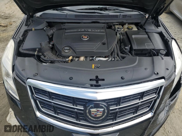 2014 Cadillac XTS Platinum z VIN 2G61W5S86E9151010, wystawiony jako Copart lot #58155335 z przebiegiem 48 437 mil mil oraz Szkoda całkowita • Salvage title. Historia ofert i sprzedaży dostępna na DreamBid. Obrazek 11.