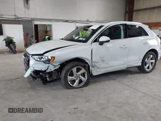 2020 Audi Q3 Premium with VIN WA1AECF3XL1090825, listed as a IAAI auction lot 42541577 with 32,432 mi miles and . Bid and sale history available at DreamBid. Image 6.