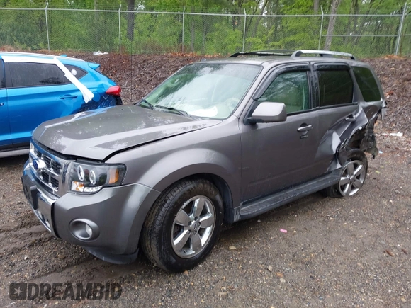 2010 Ford Escape Limited z VIN 1FMCU9EGXAKA70120, wystawiony jako IAAI lot #42330489 z przebiegiem 179 604 mil mil oraz . Historia ofert i sprzedaży dostępna na DreamBid. Obrazek 2.