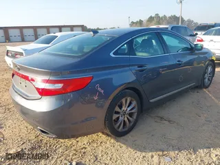 2013 Hyundai Azera with VIN KMHFG4JG6DA243655, listed as a IAAI auction lot 41802097 with 135,677 mi miles. Bid and sale history available at carsss.com. Image 4.