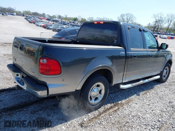 2003 Ford F-150 XLT with VIN 1FTRW07653KC18900, listed as a IAAI auction lot 41979710 with 99,525 mi miles. Bid and sale history available at carsss.com. Image 4.