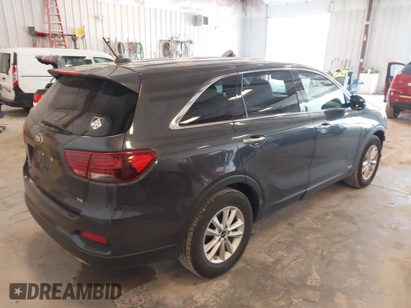 2019 Kia Sorento LX with VIN 5XYPGDA55KG556605, listed as a IAAI auction lot 42451151 with 83,171 mi miles and . Bid and sale history available at DreamBid. Image 4.