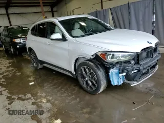 2020 BMW X1 xDrive28i z VIN WBXJG9C09L5P27695, wystawiony jako Copart lot #57039795 z przebiegiem 53 242 mil mil oraz Szkoda całkowita • Salvage title. Historia ofert i sprzedaży dostępna na DreamBid. Obrazek 15.