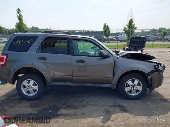 2012 Ford Escape XLT with VIN 1FMCU9DG6CKA99439, listed as a IAAI auction lot 42497707 with 186,306 mi miles and . Bid and sale history available at DreamBid. Image 13.