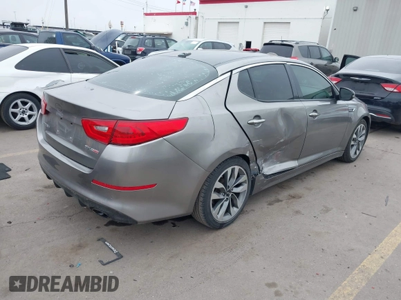 2014 Kia Optima SXL Turbo with VIN 5XXGR4A69EG312273, listed as a IAAI auction lot 41729863 with 107,660 mi miles and . Bid and sale history available at DreamBid. Image 4.