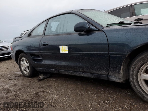 1992 Toyota MR2 z VIN JT2SW22N5N0058195, wystawiony jako Copart lot #74886194 z przebiegiem 158 816 mil mil oraz Nie do naprawy • Non repairable. Historia ofert i sprzedaży dostępna na DreamBid. Obrazek 12.