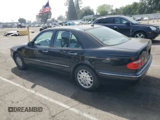 2002 Mercedes-Benz E-Class with VIN WDBJF82JX2X064384, listed as a Copart auction lot 53058325 with 188,440 mi miles and Salvage Title. Bid and sale history available at carsss.com. Image 2.