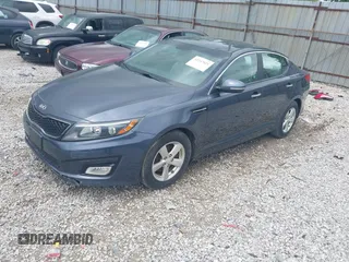 2015 Kia Optima LX z VIN KNAGM4A74F5575202, wystawiony jako IAAI lot #42247021 z przebiegiem 160 023 mil mil oraz . Historia ofert i sprzedaży dostępna na DreamBid. Obrazek 2.