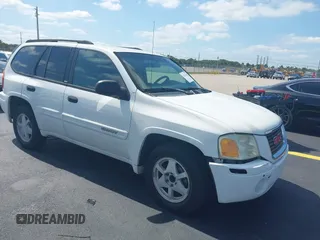 2003 GMC Envoy SLT z VIN 1GKDS13S532221928, wystawiony jako IAAI lot #42211340 z przebiegiem 149 902 mil mil oraz . Historia ofert i sprzedaży dostępna na DreamBid. Obrazek 1.