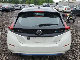 2019 Nissan LEAF SV z VIN 1N4AZ1CP1KC306320, wystawiony jako Copart lot #55686825 z przebiegiem 39 261 mil mil oraz Szkody całkowita. Historia ofert i sprzedaży dostępna na DreamBid. Obrazek 6.
