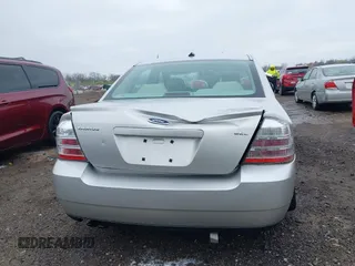 2008 Ford Taurus SEL with VIN 1FAHP24W68G122802, listed as a IAAI auction lot 42020217 with 168,265 mi miles. Bid and sale history available at carsss.com. Image 6.