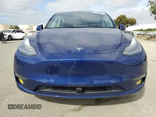 2021 Tesla Model Y Long Range with VIN 5YJYGDEEXMF192447, listed as a Copart auction lot 53550055 with 65,673 mi miles and Salvage Title. Bid and sale history available at DreamBid. Image 5.