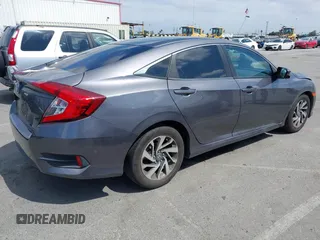 2016 Honda Civic Sedan EX with VIN 2HGFC2F7XGH526418, listed as a IAAI auction lot 41890264 with 124,620 mi miles. Bid and sale history available at carsss.com. Image 4.