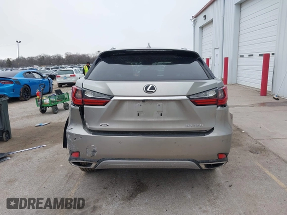 2021 Lexus RX with VIN 2T2HZMDA4MC305057, listed as a IAAI auction lot 41706486 with 37,518 mi miles. Bid and sale history available at carsss.com. Image 17.