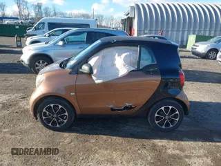 2016 Smart fortwo Passion with VIN WMEFJ5DA6GK079651, listed as a IAAI auction lot 41607293 with 146,753 mi miles and . Bid and sale history available at DreamBid. Image 14.