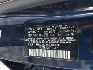 2018 Genesis G90 3.3T Premium with VIN KMHG34JA5JU043341, listed as a IAAI auction lot 41272841 with 33,527 mi miles. Bid and sale history available at carsss.com. Image 9.