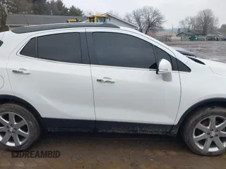 2017 Buick Encore Essence with VIN KL4CJGSB1HB102435, listed as a IAAI auction lot 41660633 with 88,249 mi miles and . Bid and sale history available at DreamBid. Image 13.