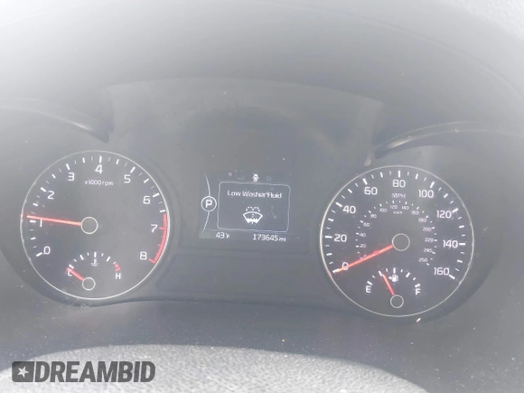 2016 Kia Optima LX z VIN 5XXGT4L34GG020666, wystawiony jako IAAI lot #41406265 z przebiegiem 173 645 mil mil oraz . Historia ofert i sprzedaży dostępna na DreamBid. Obrazek 7.