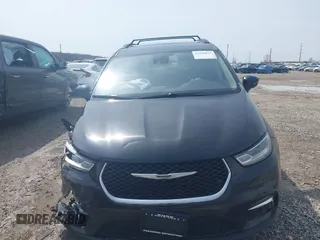 2022 Chrysler Pacifica Touring L with VIN 2C4RC1BG3NR181915, listed as a IAAI auction lot 41946833 with 69,590 mi miles and . Bid and sale history available at DreamBid. Image 13.