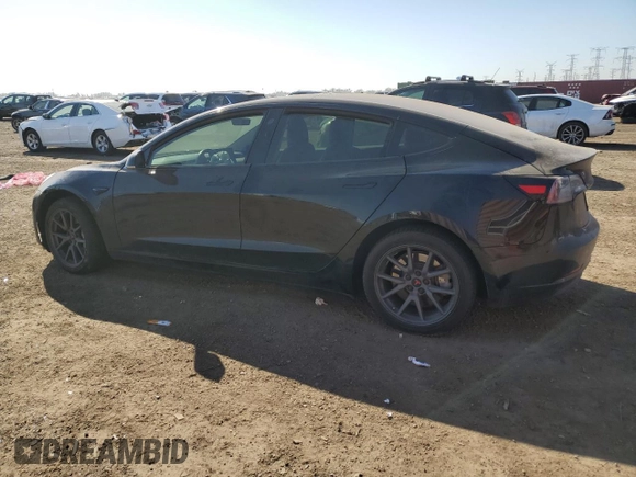 2018 Tesla Model 3 Long Range Battery with VIN 5YJ3E1EA5JF038770, listed as a Copart auction lot 48828985 with 116,641 mi miles and Salvage Title. Bid and sale history available at DreamBid. Image 2.